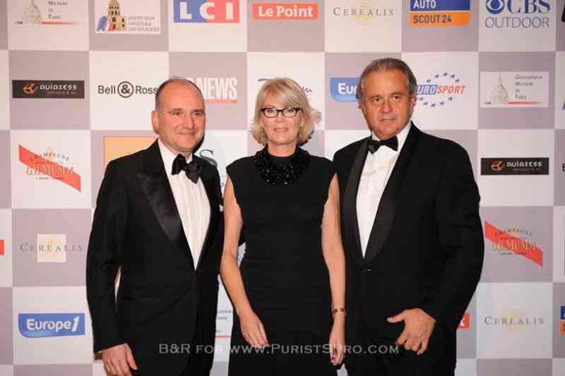 Carlos Rosillo, CEO of Bell & Ross, with Rémi Depoix, President of the Automobile Festival, and his wife Véronique Depoix.